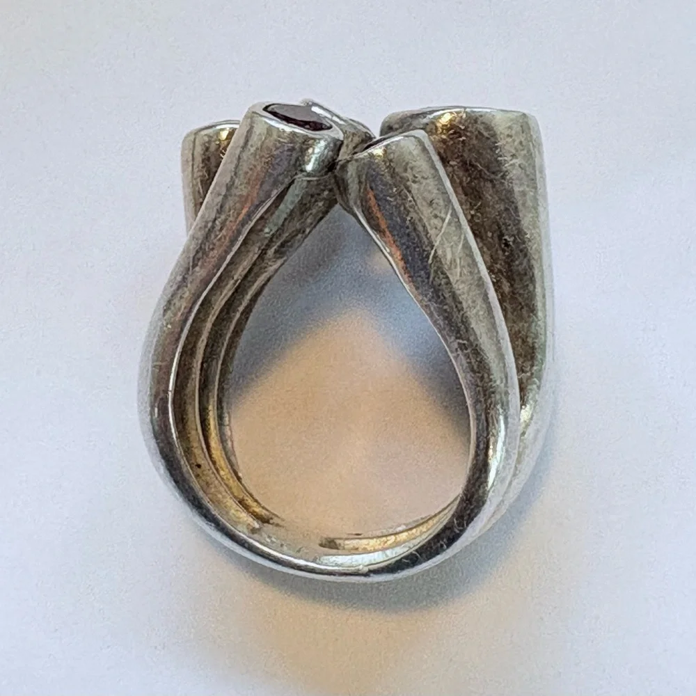 Sterling silver and garnet ring - missing a stone